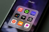 Deezer’s new tool can identify AI music from Spotify, Apple Music, and others