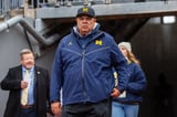 Michigan AD's future in doubt with school set to review probe into department's culture