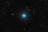 Faint new planet is revealed around a young star after a decade in hiding