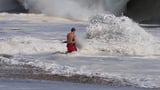 Man who captured dramatic video of lifeguard rescuing 10-year-old boy in ocean speaks to Erin Burnett | CNN