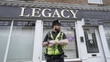 Police remove 34 bodies from English funeral home and arrest 2 for fraud and preventing burial