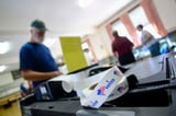 Judge halts Trump order to expand Postal Service role in elections | AP News