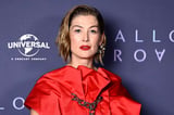 Rosamund Pike recalls getting punched and mugged while on the phone with her mom