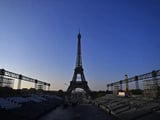 Scorching heat shuts Paris' Eiffel Tower and Louvre museum early as France swelters