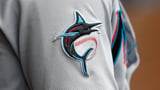 Small group of fans takes aim at Marlins after Arraez trade - ESPN