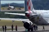 Man sucked into jet engine at busy Italian airport in suspected suicide: reports