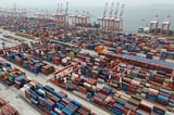 Shipping companies support a first-ever global fee on greenhouse gases, opposed by Trump officials