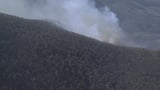 Rain helps contain still-burning wildfires in Virginia's Shenandoah Valley; state sending more aid