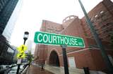 Ex-grand juror pleads guilty on contempt charge