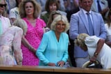Queen Camilla visits Wimbledon to sit in Royal Box | AP News