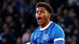 Portsmouth seal promotion with late win over Barnsley