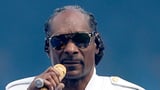 Why Australian music fans are FURIOUS about Snoop Dogg's surprise Sydney show - after rapper's celebrated AFL Grand Final performance