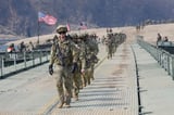 Appeals court rules against transgender military ban | AP News