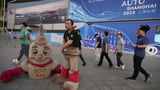 China's fast-growing EV makers pursuing varied routes to global expansion | AP News