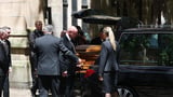 Russell Crowe delivers stirring eulogy for John Laws in front of a Who's Who of Australian showbiz and politics at radio icon's state funeral - and the signature item in front of Golden Tonsils' casket