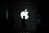 Apple cuts about 100 digital services jobs, Bloomberg News reports