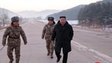 North Korea's Kim Jon-Un unveils nuclear-capable rocket system