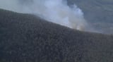 Rain helps contain still-burning wildfires in Virginia's Shenandoah Valley; state sending more aid