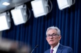 Fed holds interest rates steady, gives no sign it will cut soon as inflation fight stalls
