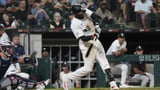 Luis Robert Jr. exits Chicago White Sox game with left hamstring soreness | AP News