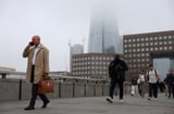 UK firms brace for hit from tax hikes, surveys show