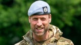 Prince William jokes family can be a 'mixed bag' as he dons military uniform on a visit to the Army...