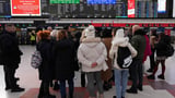 UK rail travel returns to normal after problems with a radio system disrupted the morning commute
