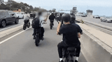 Chaos as dozens of e-bike riders descend on Sydney Harbour Bridge