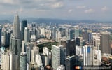 Malaysian growth unexpectedly quickens despite trade risks