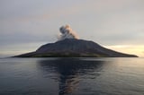 More than 2,100 people are evacuated as an Indonesian volcano spews clouds of ash