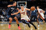 Heat blow 25-point lead, fall 121-114 to shorthanded Magic in Butler’s absence