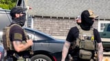 Tell us: How do you feel about ICE agents covering their faces?