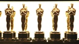The Oscars mandate voters watch all nominated movies, set new rules for AI and refugee filmmakers | AP News