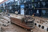 Submerged cemeteries pile pain on Spain flood survivors