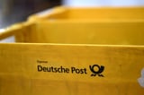 Postal workers across Germany hold one-day strike over wage demands