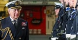 King Charles makes surprise visit to aircraft carrier with a familiar name