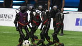 Humanoid robots captivate fans in China with fully autonomous soccer matches | AP News