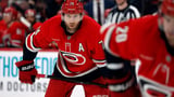 Hurricanes defenseman Slavin exits early against Flyers, status for road trip unclear | AP News