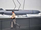 German chancellor appeared to suggest that British and French soldiers have helped Ukraine fire 'deep-strike' missiles at Russian targets, report says