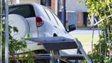 Woman charged after fatal crash at school