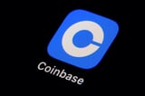 Coinbase stock rises after company posts higher revenue on crypto market upswing