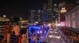 Why Singapore, Hong Kong want money to serve a purpose