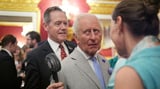 King Charles fanned by top aide as he feels heat at sweltering climate change event