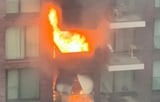 Huge fire erupts at London tower block with two flats engulfed in flames as 100 firefighters scrambled...