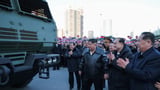 North Korea shows Kim Jong Un at the wheel of a mobile rocket launcher