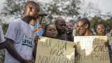 Families of the victims of attacks on displaced people in Congo mourn their dead