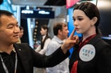 Humanoid robots show off boxing and customer service skills as they take on new jobs