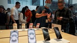 Apple partners with Alibaba to bring AI for iPhones to China, The Information reports