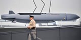 German chancellor appeared to suggest that British and French soldiers have helped Ukraine fire 'deep-strike' missiles at Russian targets, report says