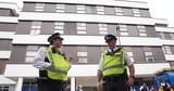 How many asylum seekers are in UK hotels and why are they being housed there?